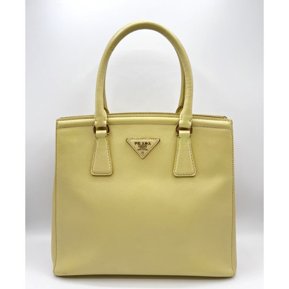 Authentic Prada Yellow Tall Top Handle Bag, very clean, includes COA. Crossbody